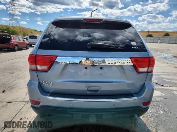 2013 Jeep Grand Cherokee Limited z VIN 1C4RJFBT9DC573370, wystawiony jako Copart lot #80716325 z przebiegiem 151 832 mil mil oraz Czysty tytuł • Clean title. Historia ofert i sprzedaży dostępna na DreamBid. Obrazek 6.