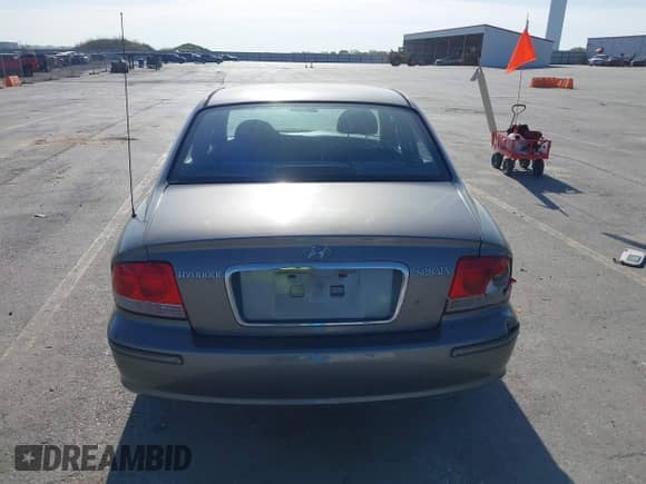 2003 Hyundai Sonata with VIN KMHWF25S03A877600, listed as a IAAI auction lot 42247620 with 85,392 mi miles and . Bid and sale history available at DreamBid. Image 17.
