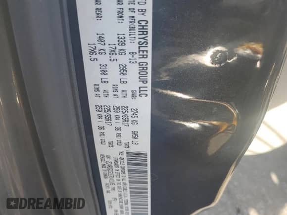 2014 Dodge Grand Caravan SXT with VIN 2C4RDGCG1ER141105, listed as a Copart auction lot 81959275 with 233,993 mi miles and Salvage title. Bid and sale history available at DreamBid. Image 12.
