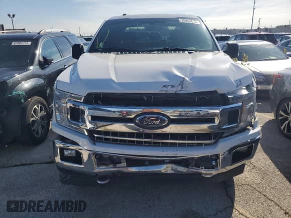 2018 Ford F-150 XL with VIN 1FTEW1E58JFE75389, listed as a Copart auction lot 70952815 with 109,135 mi miles and Salvage title. Bid and sale history available at DreamBid. Image 5.