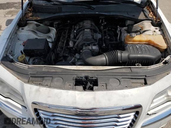 2013 Chrysler 300 C с VIN 2C3CCAETXDH508172, выставлен на аукционе Copart как лот 71185825 с пробегом 219 893 миль миль и Списание • Salvage title. История ставок и продаж доступна на DreamBid. Изображение 11.