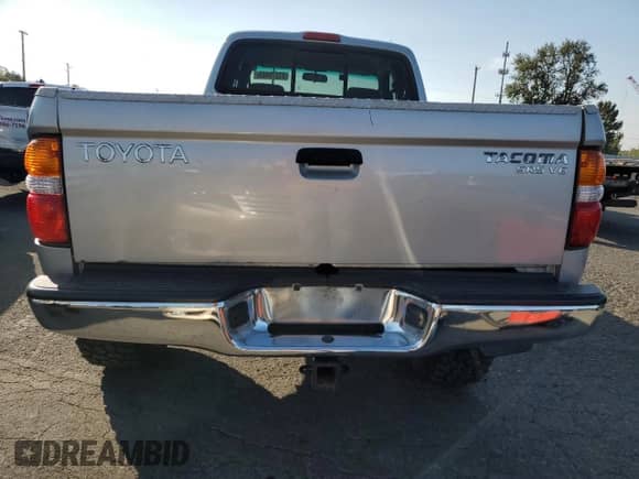 2002 Toyota Tacoma z VIN 5TEWN72NX2Z070220, wystawiony jako Copart lot #81276465 z przebiegiem 143 793 mil mil oraz Szkoda całkowita • Salvage title. Historia ofert i sprzedaży dostępna na DreamBid. Obrazek 6.