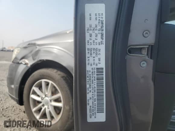 2013 Dodge Journey SXT с VIN 3C4PDDBG7DT638520, выставлен на аукционе Copart как лот 71452335 с пробегом Не указан миль и Списание • Salvage title. История ставок и продаж доступна на DreamBid. Изображение 13.