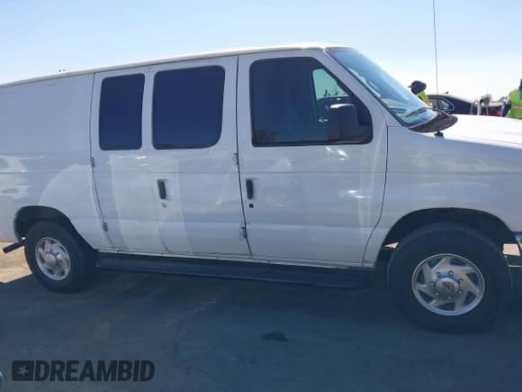 2012 Ford Econoline Cargo Recreational with VIN 1FTNE2EW2CDA52064, listed as a IAAI auction lot 43027070 with 128,381 mi miles and . Bid and sale history available at DreamBid. Image 13.
