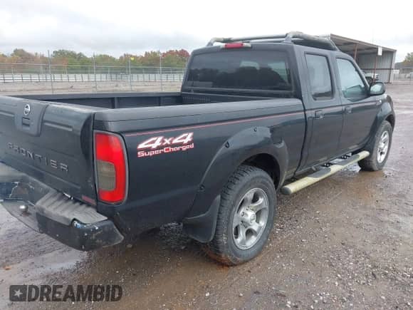 2004 Nissan Frontier SC with VIN 1N6MD29Y14C446220, listed as a IAAI auction lot 43552197 with 170,369 mi miles and . Bid and sale history available at DreamBid. Image 4.