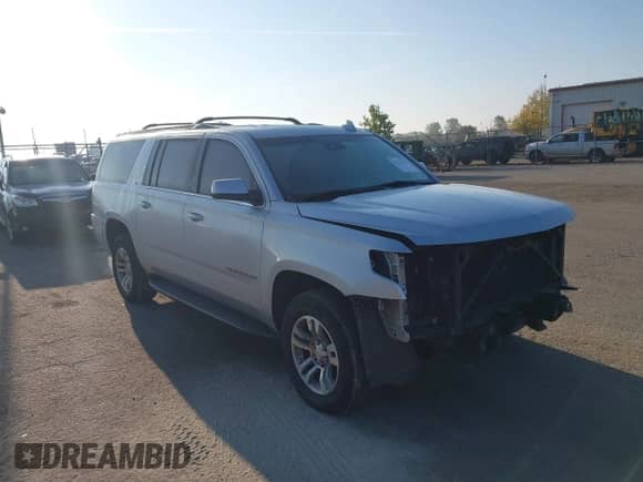 2020 Chevrolet Suburban LT with VIN 1GNSKHKC6LR304885, listed as a IAAI auction lot 43213423 with 179,235 mi miles and . Bid and sale history available at DreamBid. Image 1.