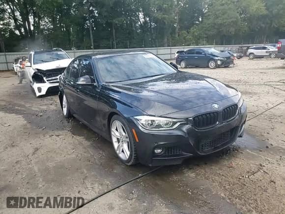 2016 BMW 3 Series 328i with VIN WBA8E9C57GK648771, listed as a Copart auction lot 83878295 with 58,829 mi miles and Salvage title. Bid and sale history available at DreamBid. Image 14.