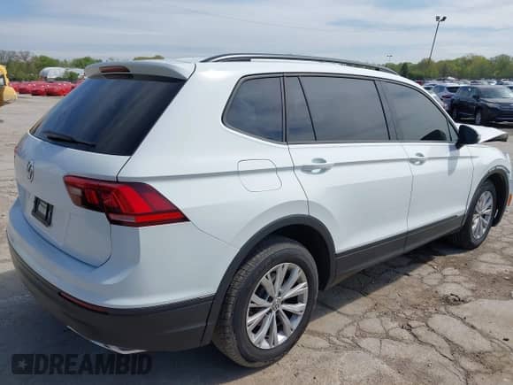 2019 Volkswagen Tiguan S с VIN 3VV0B7AX0KM027036, выставлен на аукционе IAAI как лот 42202681 с пробегом 75 192 миль миль и . История ставок и продаж доступна на DreamBid. Изображение 4.
