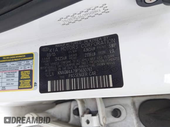 2015 Kia Optima LX z VIN KNAGM4A79F5630761, wystawiony jako IAAI lot #43379598 z przebiegiem 120 647 mil mil oraz . Historia ofert i sprzedaży dostępna na DreamBid. Obrazek 9.