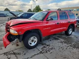 1999 Dodge Durango with VIN 1B4HS28Y8XF665252, listed as a Copart auction lot 84897495 with 173,078 mi miles and Salvage title. Bid and sale history available at DreamBid. Image 1.