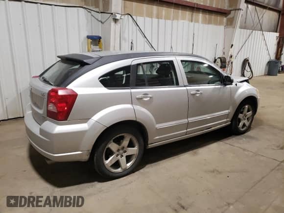 2007 Dodge Caliber R/T with VIN 1B3HE78K67D409143, listed as a Copart auction lot 71726345 with 135,238 mi miles and Salvage title. Bid and sale history available at DreamBid. Image 3.