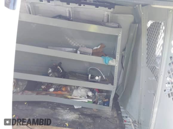 2023 Chevrolet Express Cargo with VIN 1GCWGBFPXP1112492, listed as a IAAI auction lot 43194398 with 57,576 mi miles and . Bid and sale history available at DreamBid. Image 8.