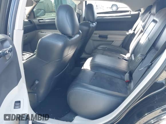 2006 Chrysler 300 C SRT-8 with VIN 2C3LA73W36H509656, listed as a IAAI auction lot 41852179 with 92,209 mi miles and . Bid and sale history available at DreamBid. Image 8.