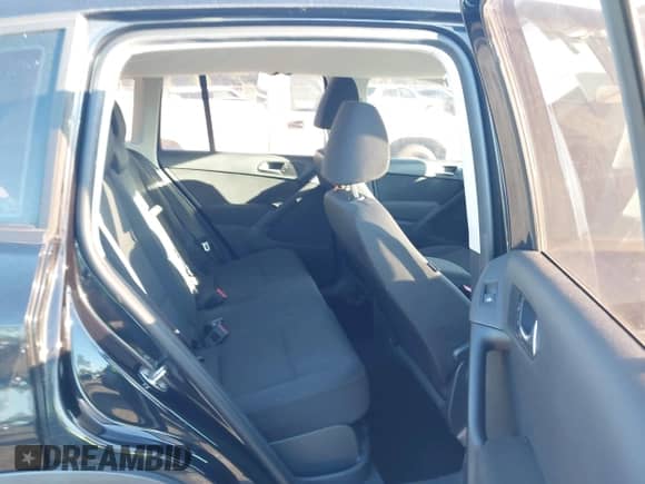 2013 Volkswagen Tiguan S with VIN WVGAV3AX5DW559819, listed as a IAAI auction lot 43436570 with 113,423 mi miles and . Bid and sale history available at DreamBid. Image 8.