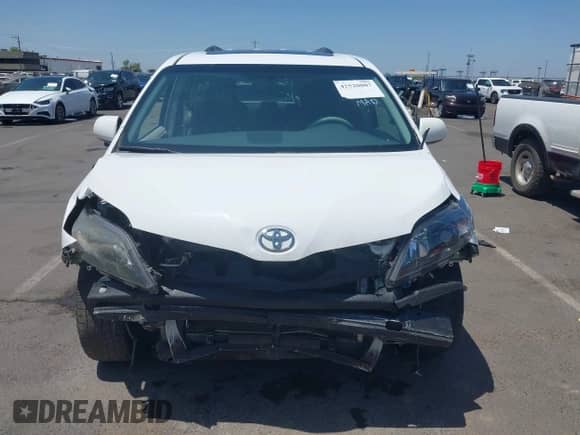 2014 Toyota Sienna SE with VIN 5TDXK3DC0ES515325, listed as a IAAI auction lot 42520007 with 155,649 mi miles and . Bid and sale history available at DreamBid. Image 6.
