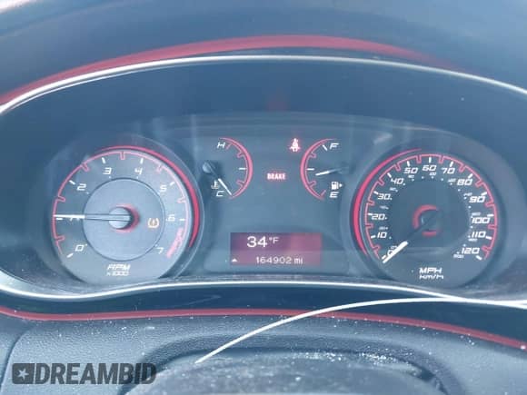 2014 Dodge Dart SE with VIN 1C3CDFAA5ED902109, listed as a IAAI auction lot 41589391 with 164,902 mi miles and . Bid and sale history available at DreamBid. Image 7.