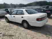 1992 Toyota Camry LE с VIN 4T1SK12E4NU035718, выставлен на аукционе Copart как лот 65820495 с пробегом 173 695 миль миль и Чистый • Clean title. История ставок и продаж доступна на DreamBid. Изображение 2.