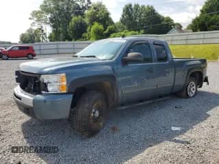 2010 Chevrolet Silverado 1500 LS with VIN 1GCSKREA8AZ175666, listed as a Copart auction lot 63051855 with 128,403 mi miles and Salvage title. Bid and sale history available at DreamBid. Image 1.