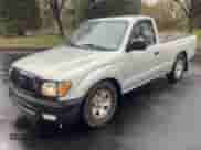 2003 Toyota Tacoma with VIN 5TENL42NX3Z150327, listed as a Copart auction lot 52352315 with 187,733 mi miles and Salvage title. Bid and sale history available at DreamBid. Image 2.