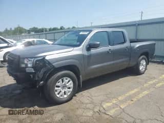 2024 Nissan Frontier SV with VIN 1N6ED1FKXRN605620, listed as a Copart auction lot 59854695 with 8,828 mi miles and Salvage title. Bid and sale history available at DreamBid. Image 1.