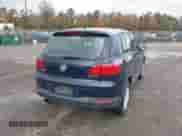 2014 Volkswagen Tiguan S with VIN WVGAV3AX7EW626163, listed as a IAAI auction lot 43591364 with 198,283 mi miles and . Bid and sale history available at DreamBid. Image 4.