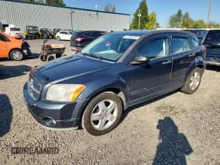 2007 Dodge Caliber SXT with VIN 1B3HB48B77D592513, listed as a Copart auction lot 81588395 with 194,376 mi miles and Salvage title. Bid and sale history available at DreamBid. Image 1.