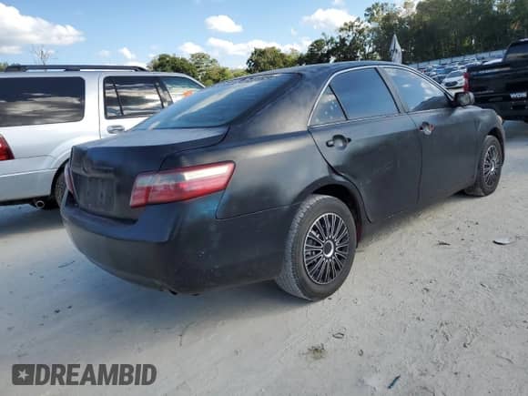 2007 Toyota Camry CE с VIN 4T1BE46K47U142666, выставлен на аукционе Copart как лот 82698075 с пробегом 245 026 миль миль и Чистый • Clean title. История ставок и продаж доступна на DreamBid. Изображение 3.