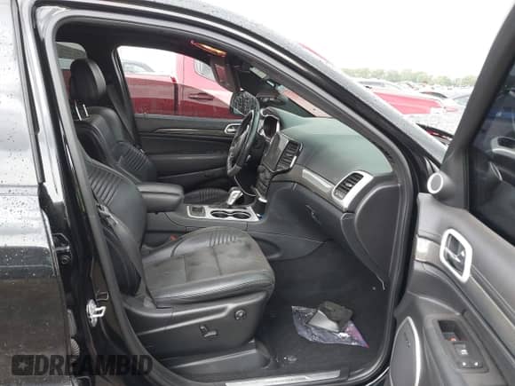 2020 Jeep Grand Cherokee Trackhawk with VIN 1C4RJFN9XLC419054, listed as a IAAI auction lot 42586248 with 42,206 mi miles and . Bid and sale history available at DreamBid. Image 5.