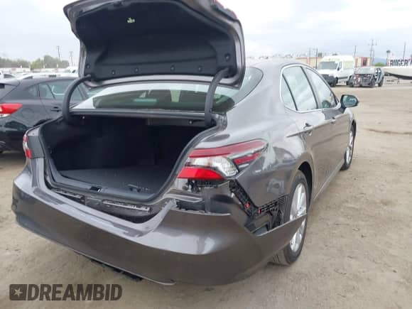 2023 Toyota Camry LE z VIN 4T1C11AKXPU119236, wystawiony jako IAAI lot #43326388 z przebiegiem 23 626 mil mil oraz . Historia ofert i sprzedaży dostępna na DreamBid. Obrazek 19.