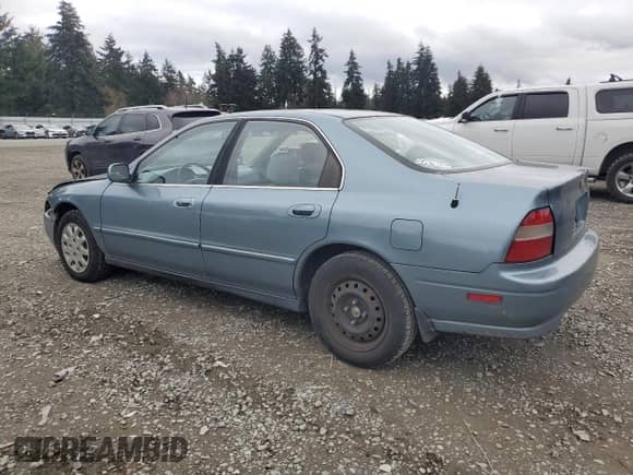 1995 Honda Accord with VIN 1HGCE6643SA023721, listed as a Copart auction lot 47793515 with 111,527 mi miles and Salvage title. Bid and sale history available at DreamBid. Image 2.