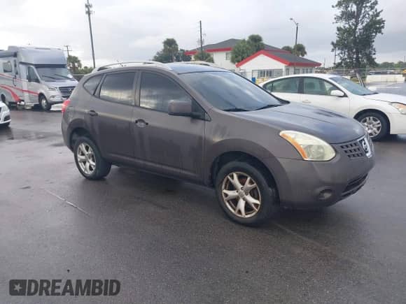 2009 Nissan Rogue SL z VIN JN8AS58T59W045525, wystawiony jako IAAI lot #41209501 z przebiegiem 203 642 mil mil oraz . Historia ofert i sprzedaży dostępna na DreamBid. Obrazek 1.