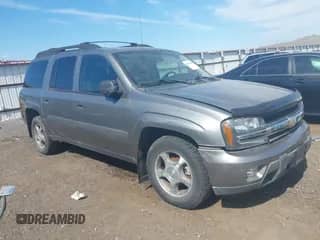 2005 Chevrolet TrailBlazer LT z VIN 1GNET16S856133743, wystawiony jako IAAI lot #42652687 z przebiegiem 143 804 mil mil oraz . Historia ofert i sprzedaży dostępna na DreamBid. Obrazek 1.