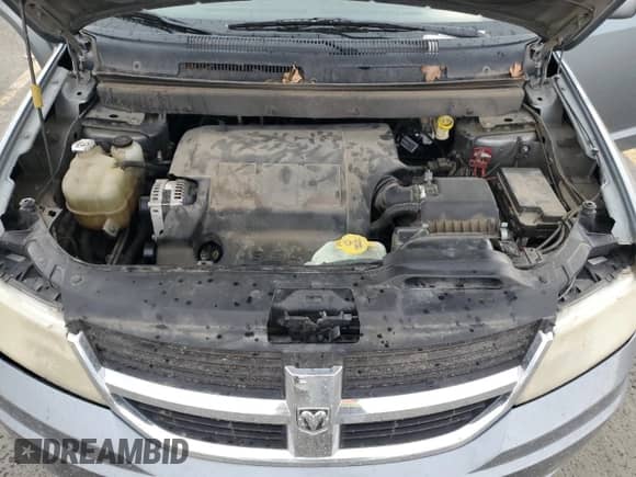 2010 Dodge Journey SXT z VIN 3D4PG5FV8AT140198, wystawiony jako Copart lot #80118575 z przebiegiem 212 976 mil mil oraz Szkoda całkowita • Salvage title. Historia ofert i sprzedaży dostępna na DreamBid. Obrazek 12.