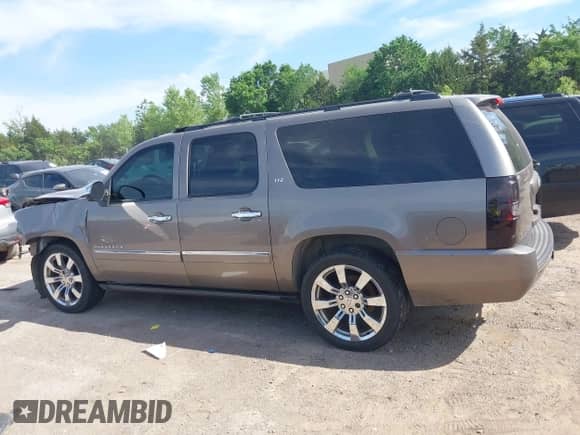 2011 Chevrolet Suburban LTZ с VIN 1GNSCKE04BR312543, выставлен на аукционе IAAI как лот 42267293 с пробегом 253 305 миль миль и . История ставок и продаж доступна на DreamBid. Изображение 14.