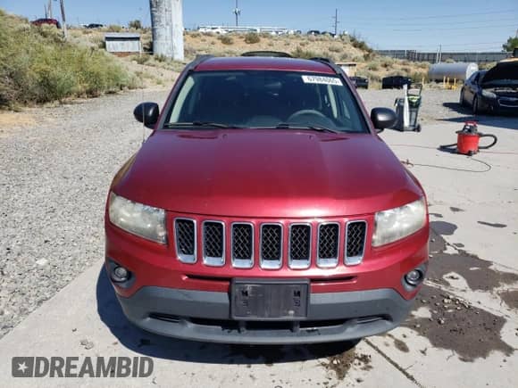 2014 Jeep Compass Sport with VIN 1C4NJDBB8ED567758, listed as a Copart auction lot 67984065 with 123,788 mi miles and Salvage title. Bid and sale history available at DreamBid. Image 5.
