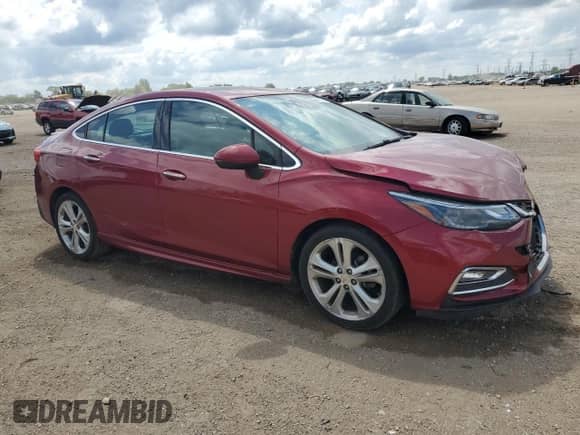 2017 Chevrolet Cruze Premier with VIN 1G1BF5SM4H7141847, listed as a Copart auction lot 69916315 with 68,913 mi miles and Salvage title. Bid and sale history available at DreamBid. Image 4.