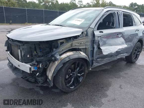 2022 Kia Sorento SX with VIN 5XYRK4LF5NG146016, listed as a IAAI auction lot 43288021 with 94,360 mi miles and . Bid and sale history available at DreamBid. Image 6.