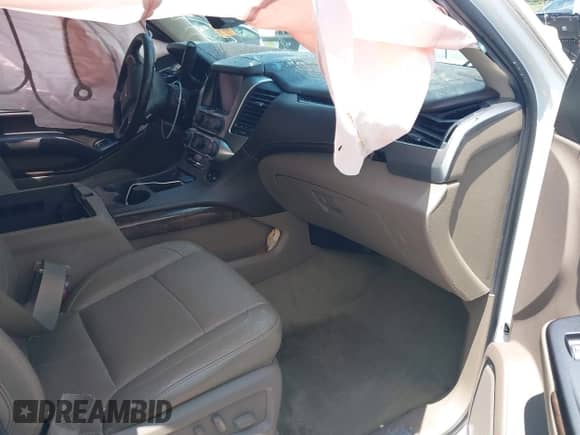 2015 Chevrolet Suburban LT z VIN 1GNSCJKC5FR587787, wystawiony jako IAAI lot #42801743 z przebiegiem Nie podano mil oraz . Historia ofert i sprzedaży dostępna na DreamBid. Obrazek 5.