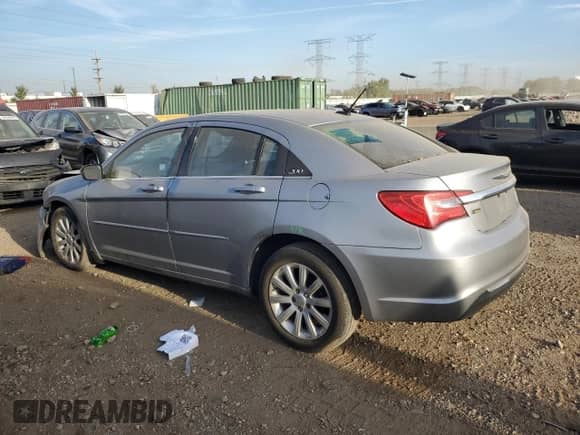 2013 Chrysler 200 Touring with VIN 1C3CCBBG7DN704056, listed as a Copart auction lot 81915575 with 142,327 mi miles and Salvage title. Bid and sale history available at DreamBid. Image 2.