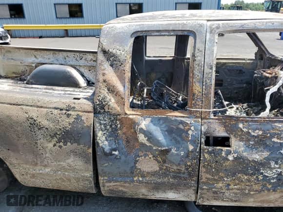 1997 Chevrolet Silverado 2500 с VIN 1GCGK29J0VE239168, выставлен на аукционе Copart как лот 62146355 с пробегом Не указан миль и Списание • Salvage title. История ставок и продаж доступна на DreamBid. Изображение 10.