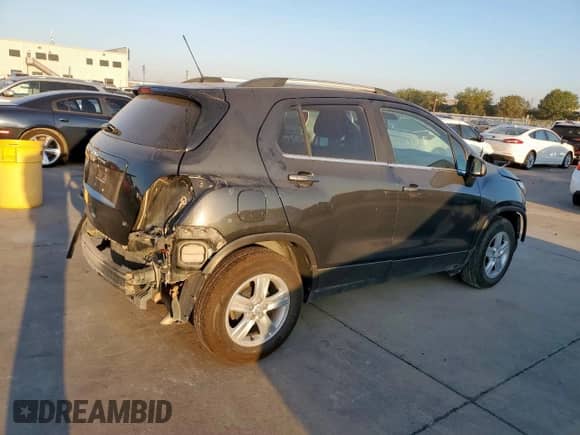 2018 Chevrolet Trax LT z VIN 3GNCJLSB3JL258647, wystawiony jako Copart lot #85125745 z przebiegiem 96 940 mil mil oraz Czysty tytuł • Clean title. Historia ofert i sprzedaży dostępna na DreamBid. Obrazek 3.