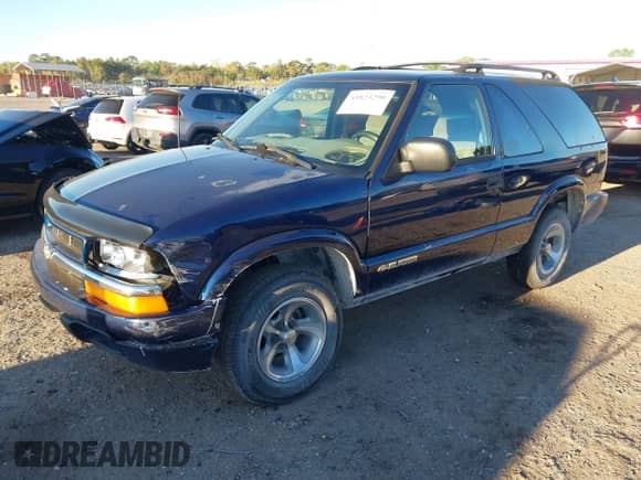 2002 Chevrolet Blazer LS с VIN 1GNCS18W12K127425, выставлен на аукционе IAAI как лот 41823290 с пробегом 182 949 миль миль и . История ставок и продаж доступна на DreamBid. Изображение 2.