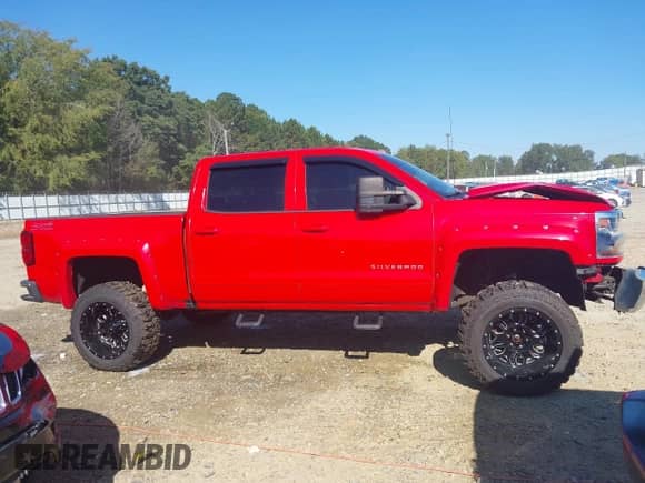 2016 Chevrolet Silverado 1500 LT with VIN 3GCUKREC4GG374930, listed as a IAAI auction lot 43190913 with 135,497 mi miles and . Bid and sale history available at DreamBid. Image 13.