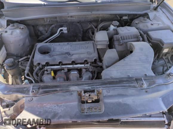 2012 Hyundai Santa Fe GLS z VIN 5XYZGDAB8CG123957, wystawiony jako Copart lot #68682695 z przebiegiem 148 706 mil mil oraz Szkoda całkowita • Salvage title. Historia ofert i sprzedaży dostępna na DreamBid. Obrazek 11.