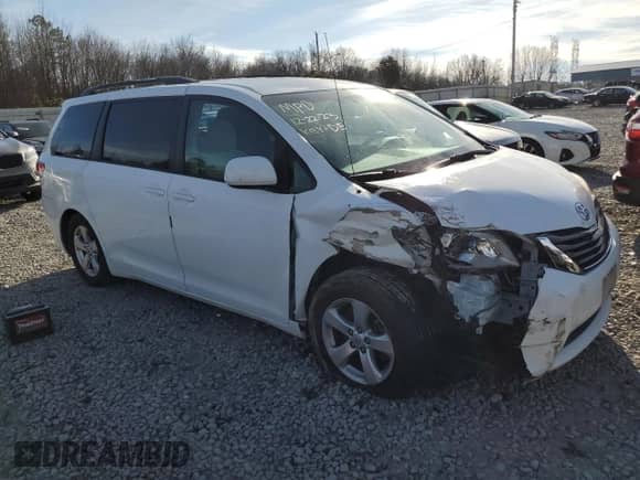 2011 Toyota Sienna LE AAS with VIN 5TDKK3DC0BS109888, listed as a Copart auction lot 68040624 with 96,549 mi miles and Salvage title. Bid and sale history available at DreamBid. Image 4.