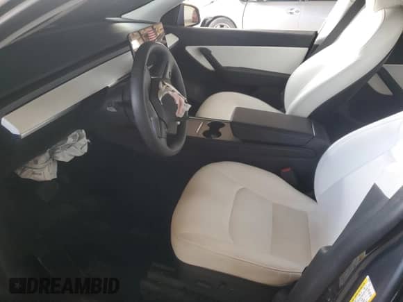 2021 Tesla Model Y Long Range with VIN 5YJYGDEE7MF206059, listed as a Copart auction lot 80559965 with 77,329 mi miles and Salvage title. Bid and sale history available at DreamBid. Image 7.