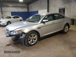 2010 Ford Taurus SEL with VIN 1FAHP2HW0AG103906, listed as a Copart auction lot 63435455 with 82,455 mi miles and Salvage title. Bid and sale history available at DreamBid. Image 1.