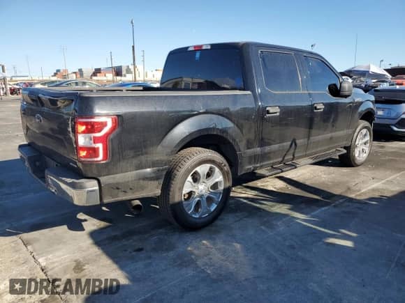 2018 Ford F-150 XL с VIN 1FTEW1CG8JKD84683, выставлен на аукционе Copart как лот 84987445 с пробегом 125 163 миль миль и Списание • Salvage title. История ставок и продаж доступна на DreamBid. Изображение 3.