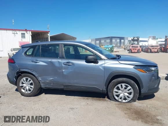 2022 Toyota Corolla Cross L with VIN 7MUAAAAG7NV029721, listed as a IAAI auction lot 43304097 with 31,139 mi miles and . Bid and sale history available at DreamBid. Image 13.