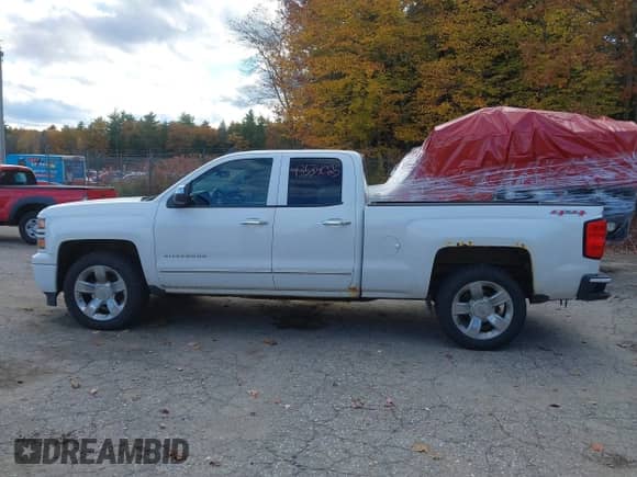 2015 Chevrolet Silverado 1500 LT with VIN 1GCVKREC9FZ326472, listed as a IAAI auction lot 43534025 with 288,869 mi miles and . Bid and sale history available at DreamBid. Image 14.